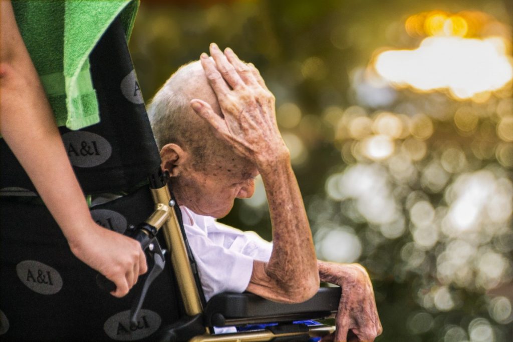 hospice care elderly in wheel chair elderly old senior nurse patient 1217264